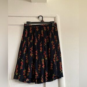 Clio Black Skirt with Red Floral Design